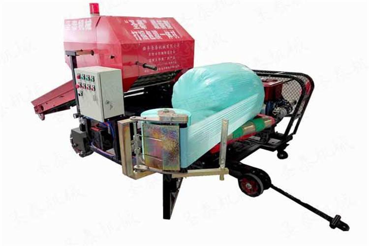 打捆包膜机与动力机器装备好后,开至收割完毕的麦田内,检查动力机械的动力与打捆机是否接触完好 打捆包膜机与动力机器装备好后,开至收割完毕的麦田内,检查动力机械的动力与打捆机是否接触完好